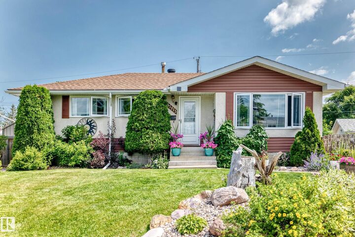 Property Photo:  13815 62 Street NW  AB T5A 1P6 
