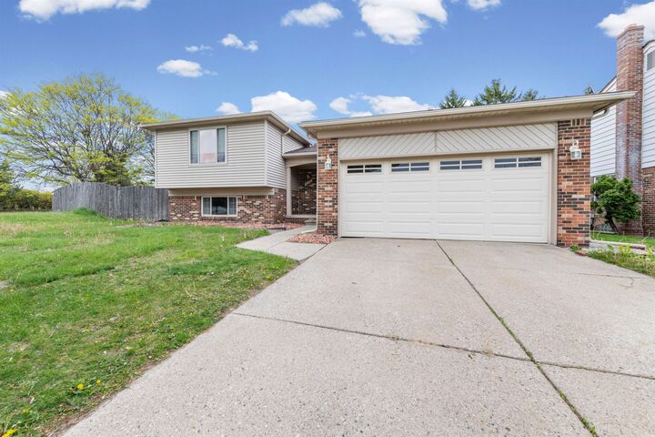 Property Photo: 38982 Sutton Dr Drive MI 48310
