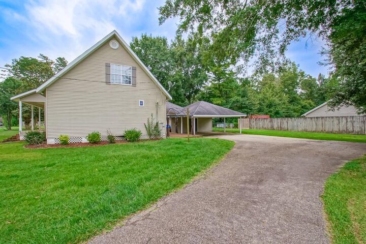 Property Photo:  42773 Robinwood Drive  LA 70403 
