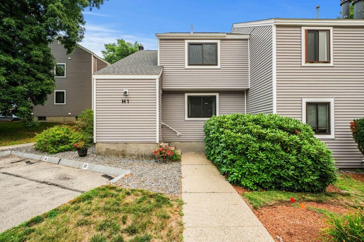 Property Photo:  1H Black Oak Drive  NH 03062 