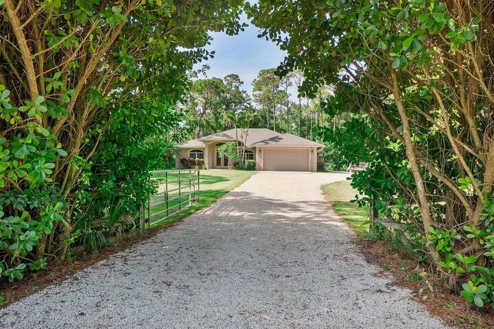 Property Photo:  9608 Mockingbird Trail  FL 33478 