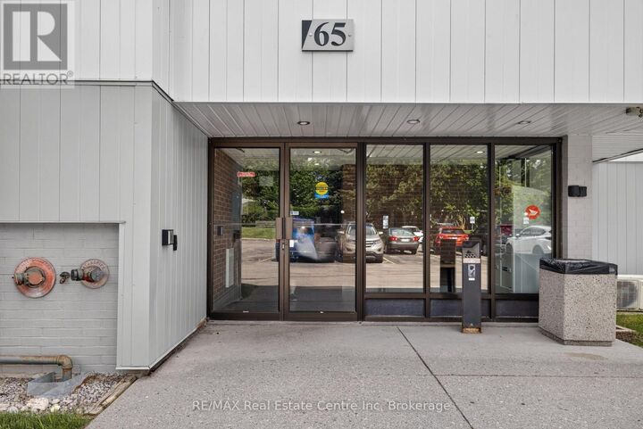 Property Photo: 65 Silvercreek Parkway North 401 ON N1H 7R9