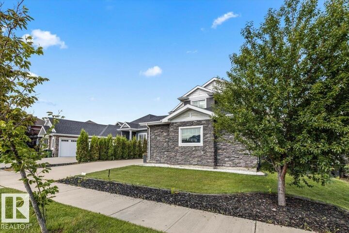 Property Photo: 1242 Starling Drive NW AB T5S 0K4