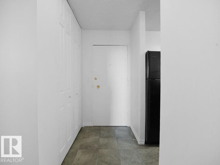 Property Photo: 13910 Stony Plain Rd NW 912 AB T5N 3R2