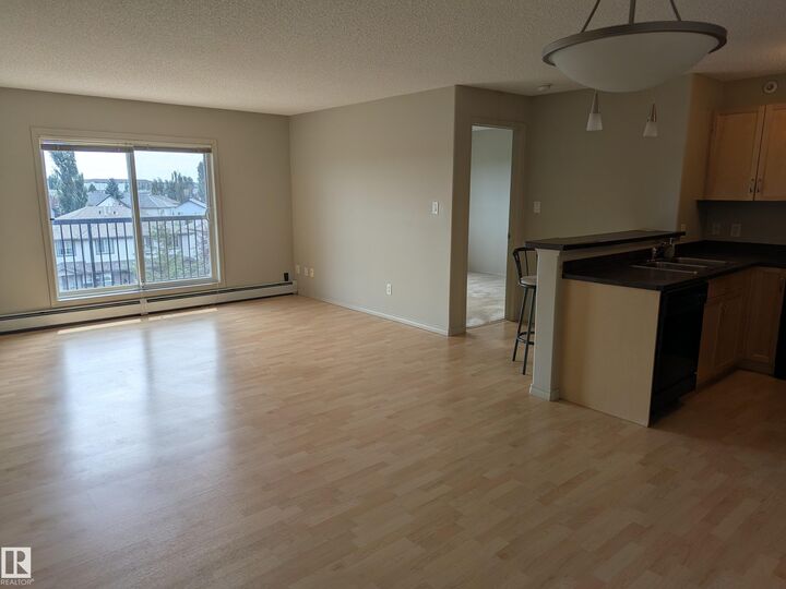 Property Photo: 646 McAllister Loop SW 417 AB T5W 0B5