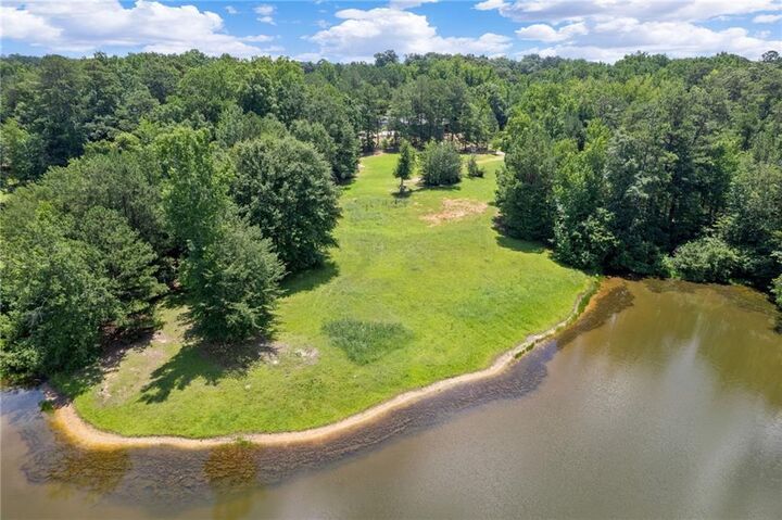 Property Photo:  10861 Hutcheson Ferry Road  GA 30268 