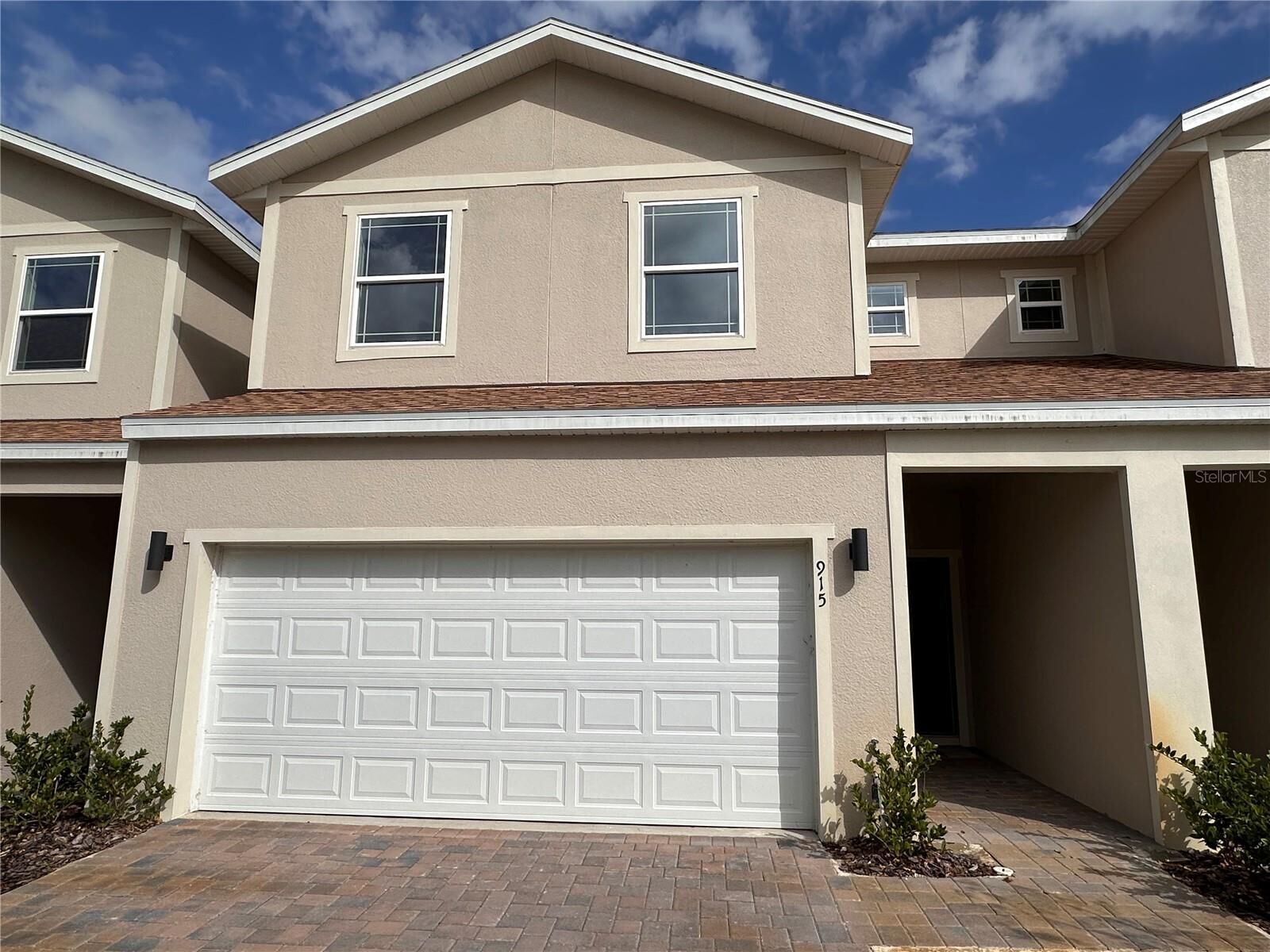 Property Photo:  915 Lakefront Village Drive  FL 34711 
