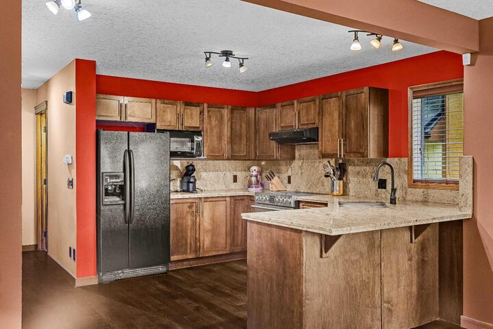 Property Photo: 108 Armstrong Place 202 AB T1W 3L2