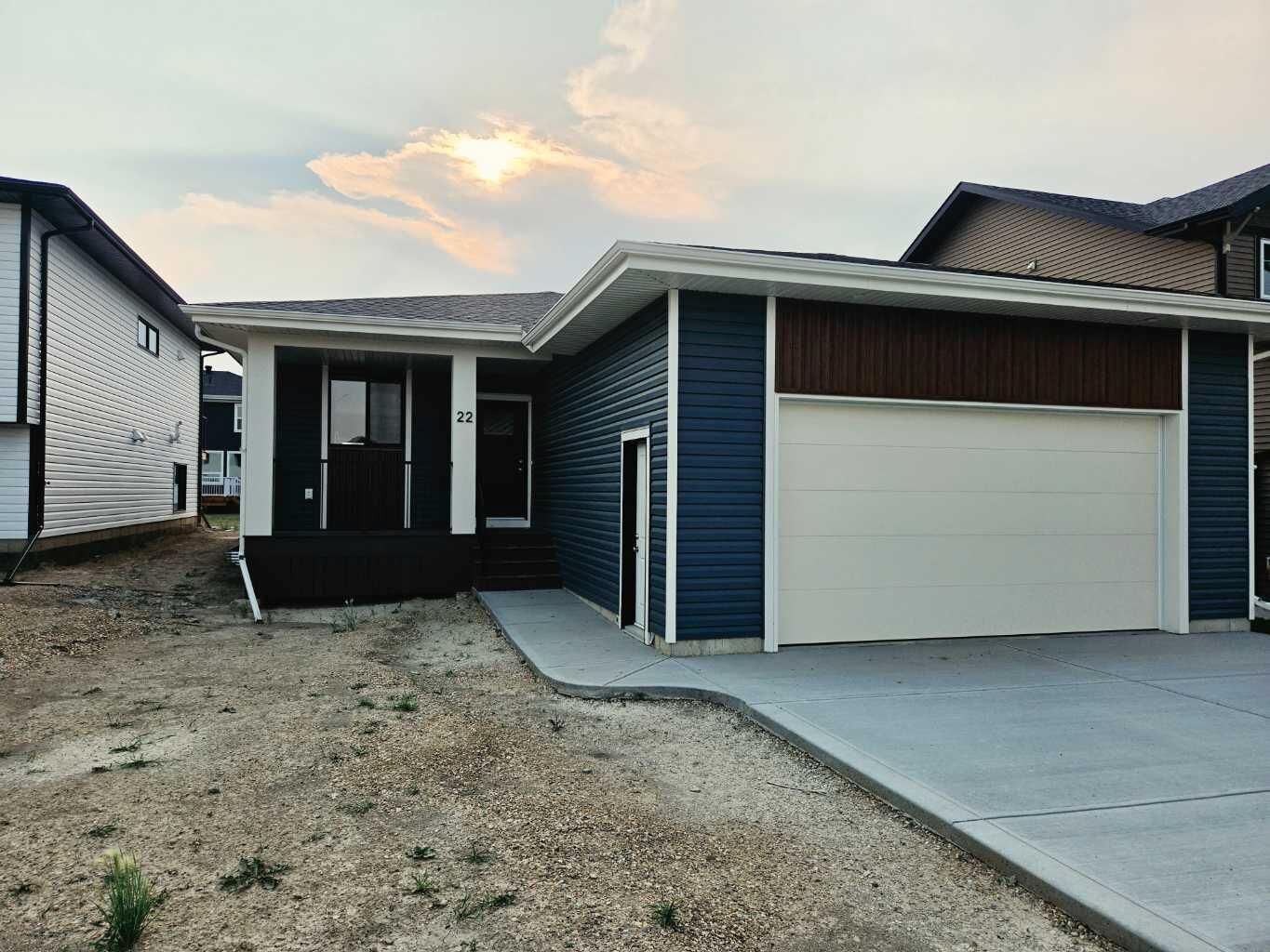 Property Photo: 22 Tagish Avenue AB T4P 0Y7