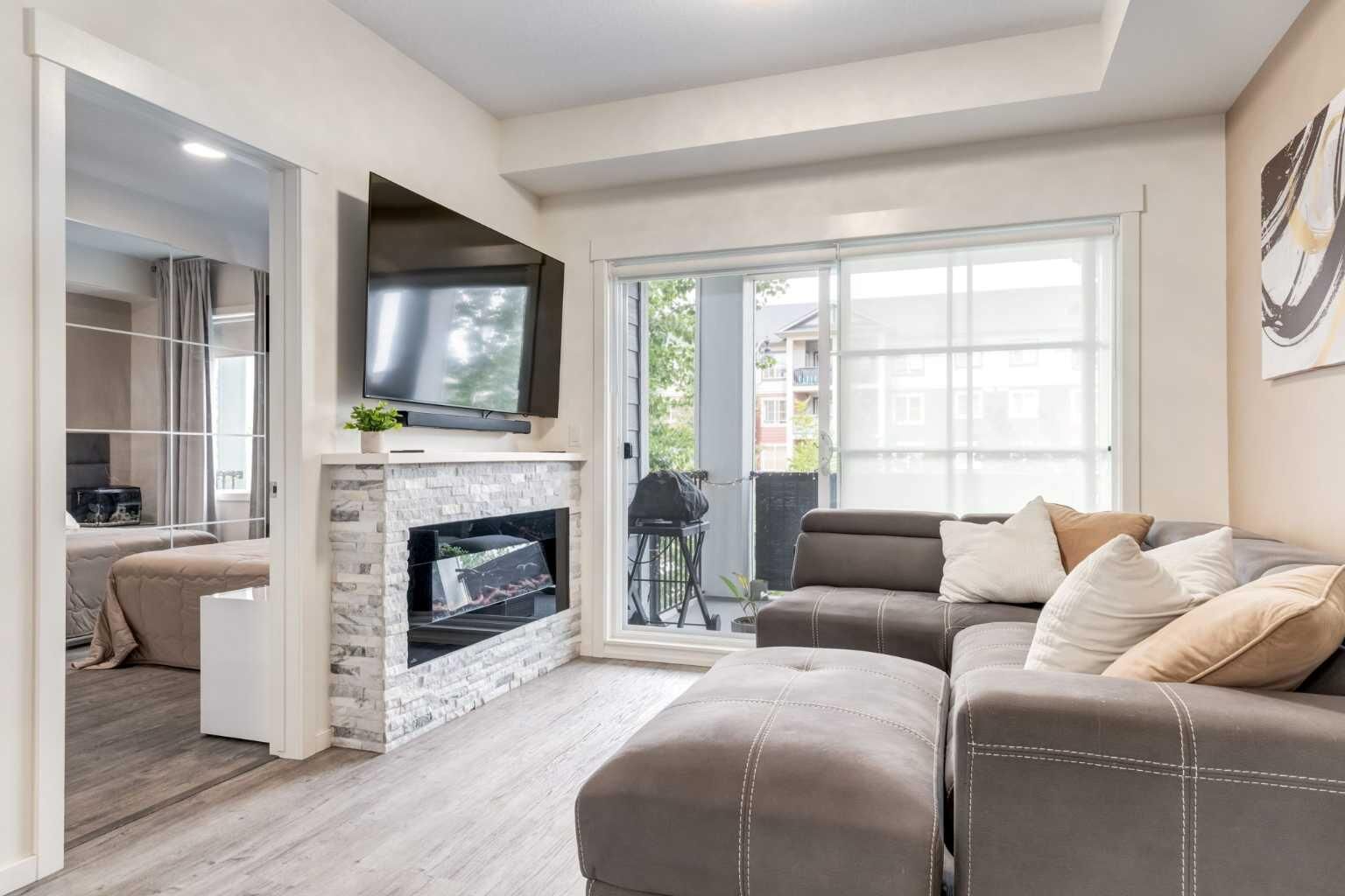 Property Photo:  151 Legacy Main Street SE 8205  AB T2X 4A4 