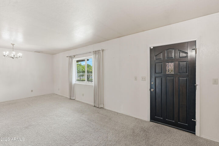 Property Photo: 7909 W Country Gables Drive AZ 85381