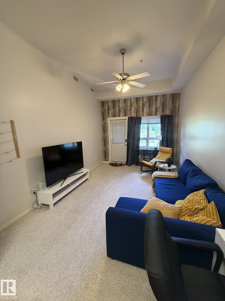 Property Photo: 8702 Southfort Drive 104 AB T8L 4R6