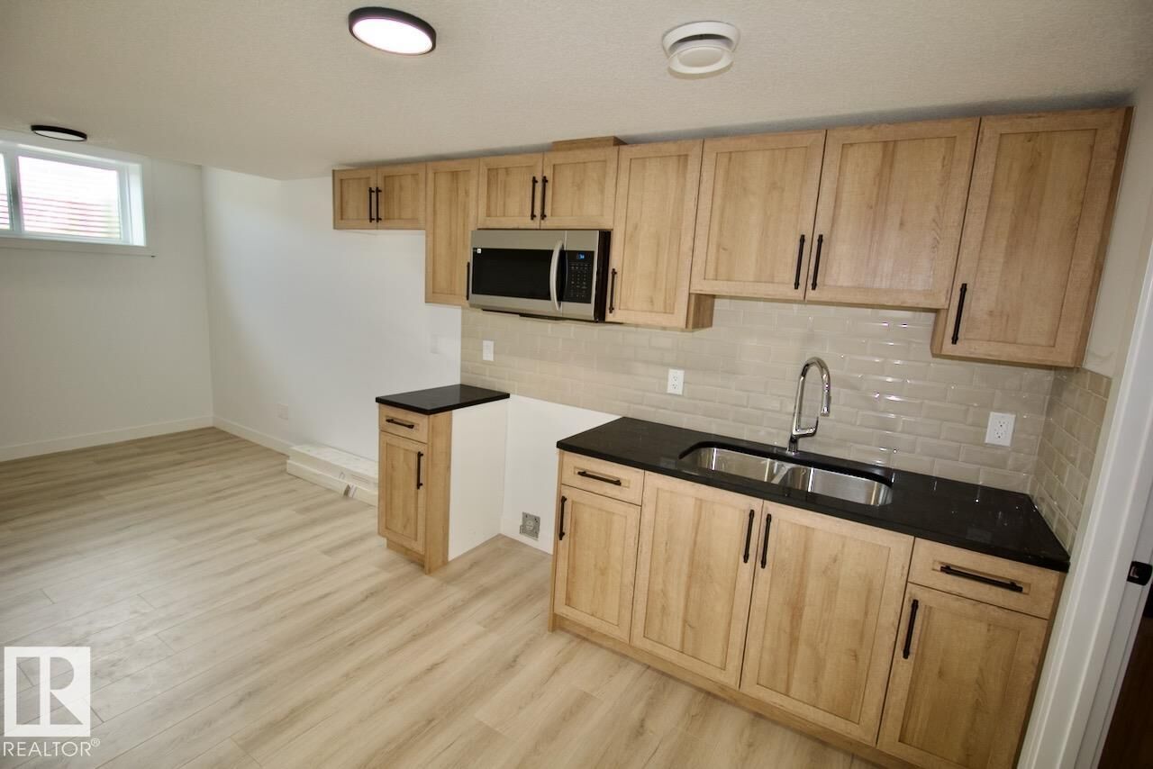 Property Photo: 8857 Carson Way SW Bsmt AB T6W 5B8