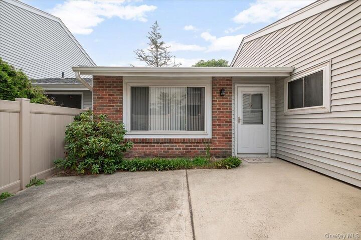 Property Photo: 221 Springmeadow Drive J NY 11741