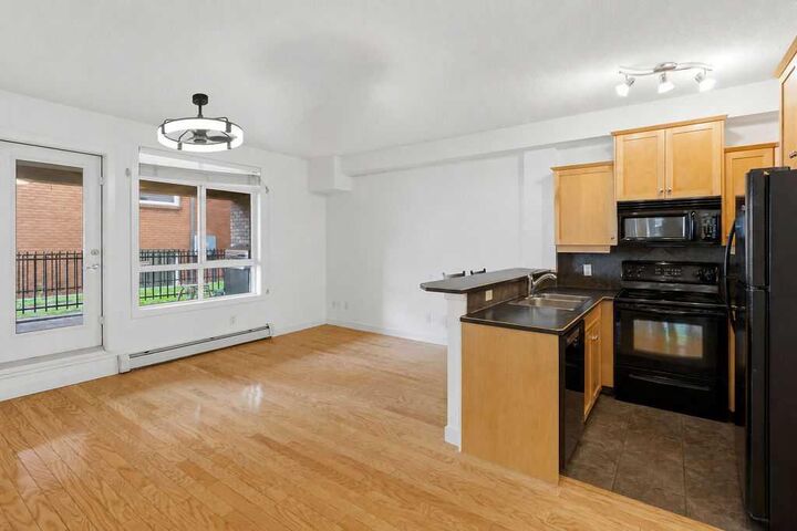 Property Photo:  323 18 Avenue SW 106  AB T2S 0C4 