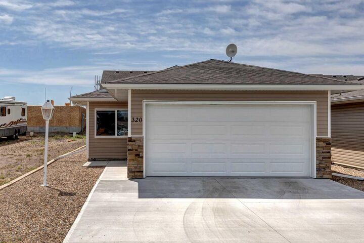 Property Photo: 320 Whispering Way AB T0L 2B0