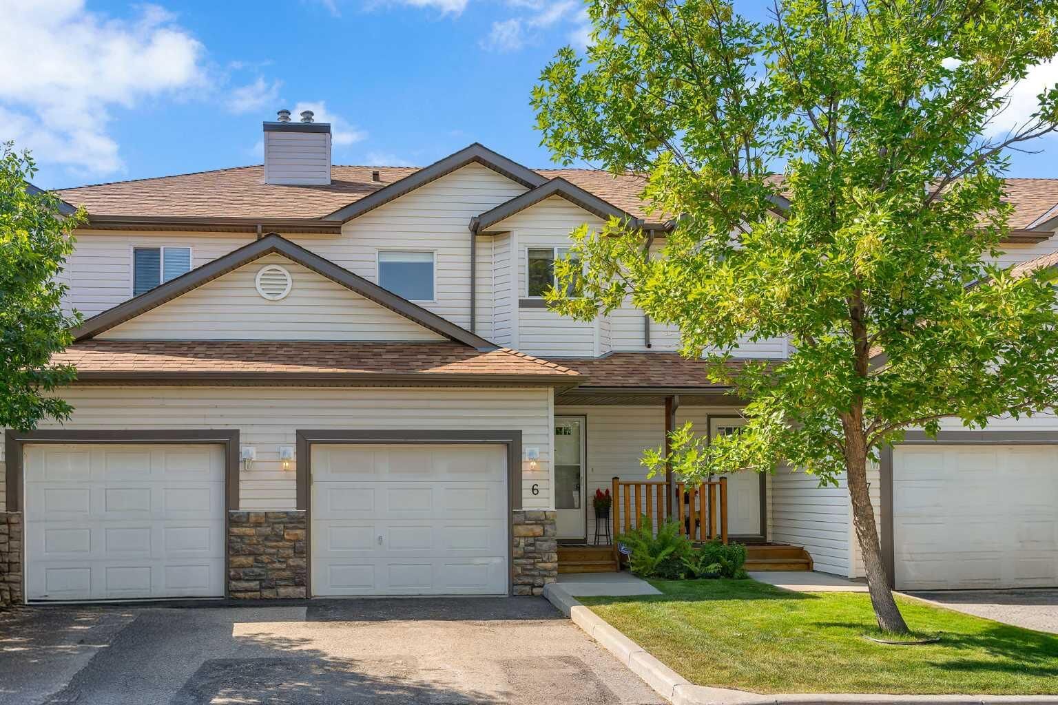 Property Photo: 156 Canoe Drive SW 6 AB T4B 2Z3