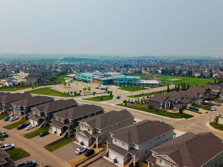 Property Photo:  10307A 149 Avenue  AB T8X 0S1 