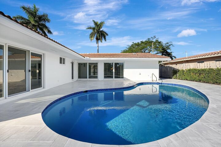 Property Photo: 1478 NE 57th Court FL 33334