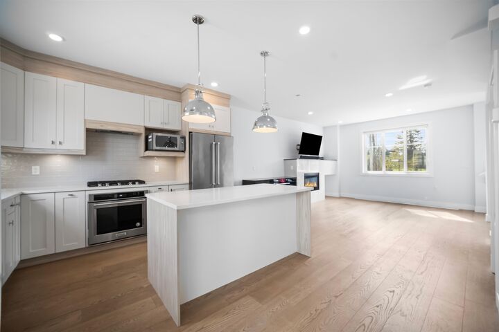 Property Photo: 5377 8A Avenue 7 BC V4M 0E2
