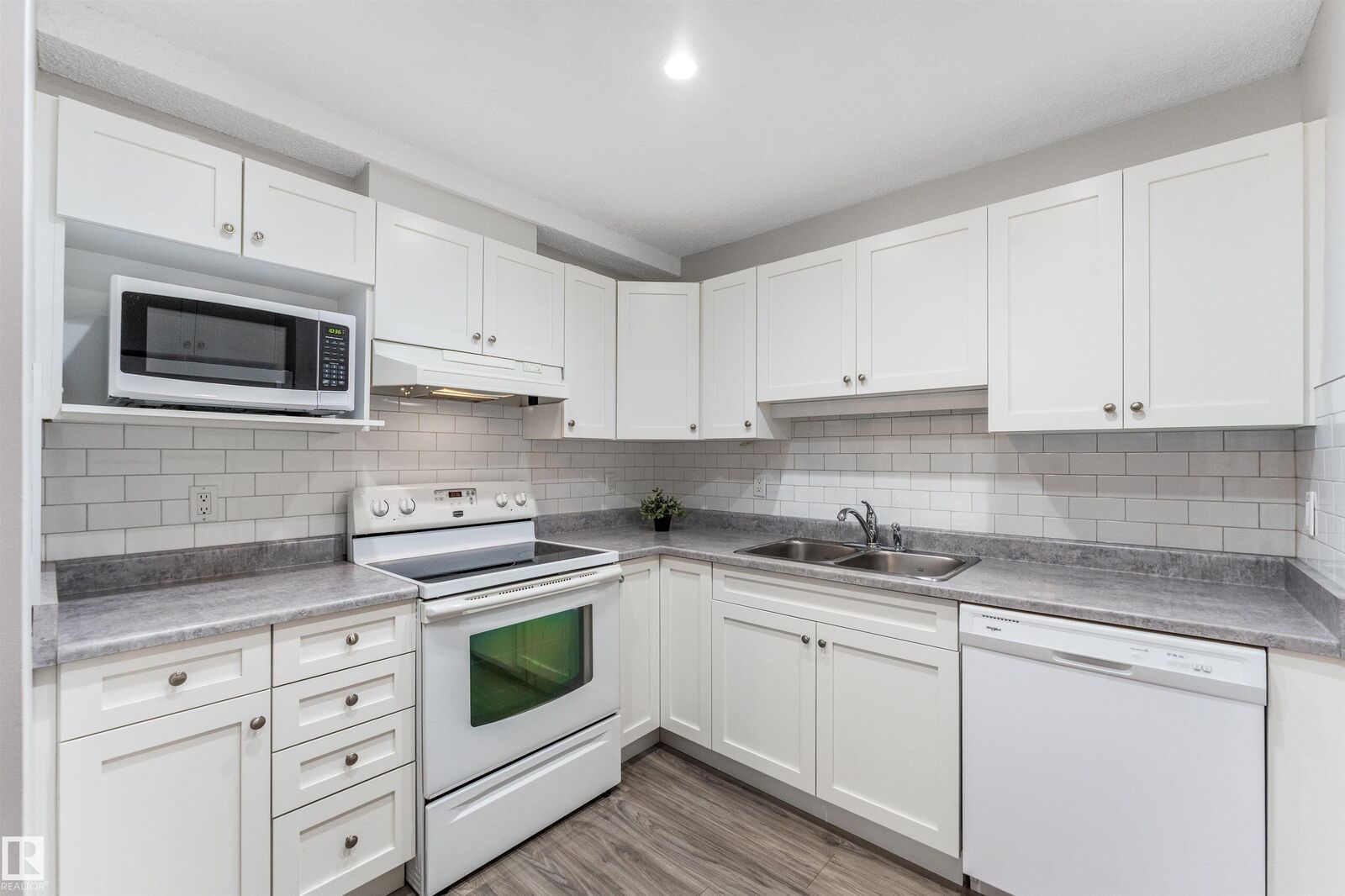 Property Photo: 18012 95 Avenue NW 115 AB T5T 5Z2