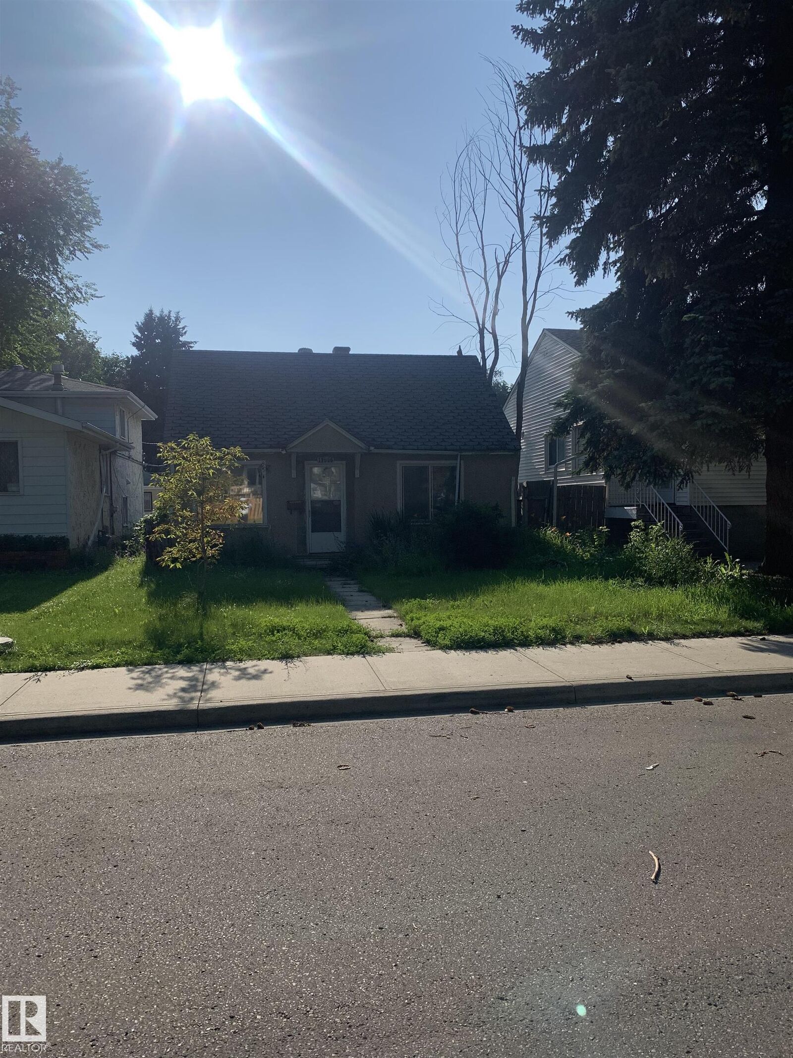 Property Photo:  11906 63 Street NW  AB T5W 4G3 