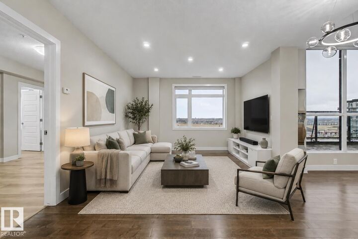 Property Photo: 5151 Windermere Boulevard SW 1225 AB T6W 2K4