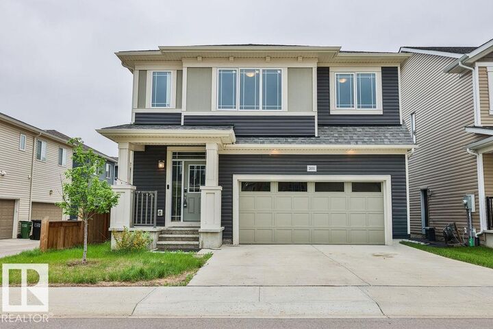 Property Photo: 2031 207 Street NW AB T6M 1R7