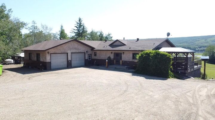 Property Photo: 231061 Highway 684 AB T8S 1S5