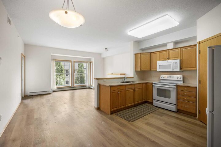 Property Photo: 151 Country Village Road NE 2458 AB T3K 5X5