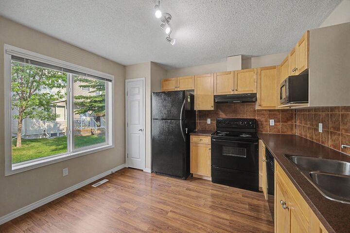 Property Photo: 65 Royal Birch Villas NW AB T3G 5V2
