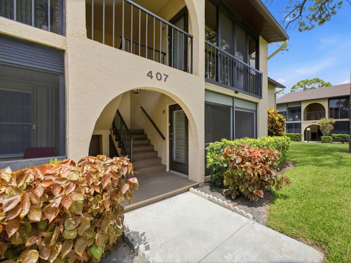 Property Photo:  407 Pine Glen Lane B-1  FL 33463 