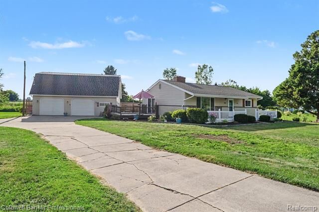 Property Photo:  10143 N Bray Road  MI 48420 