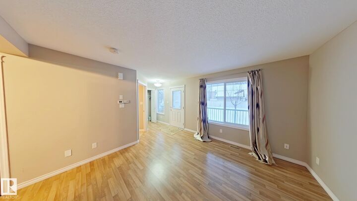 Property Photo:  7665 Schmid Crescent NW  AB T6R 0K7 