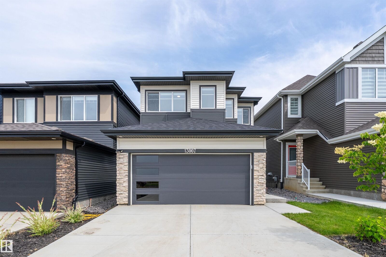 Property Photo: 13007 213 Street NW AB T5S 0T7