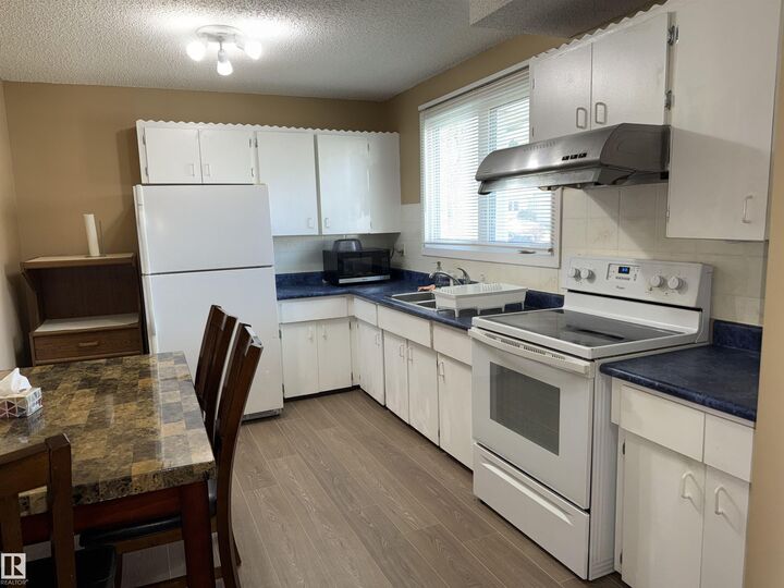 Property Photo:  5645 137 Avenue NW  AB T5A 2H4 
