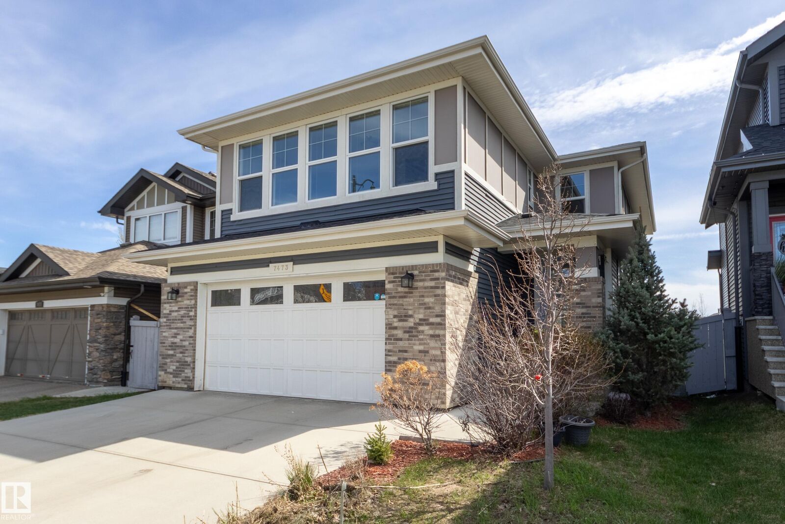 Property Photo:  7473 Colonel Mewburn Road NW  AB T5E 6V5 