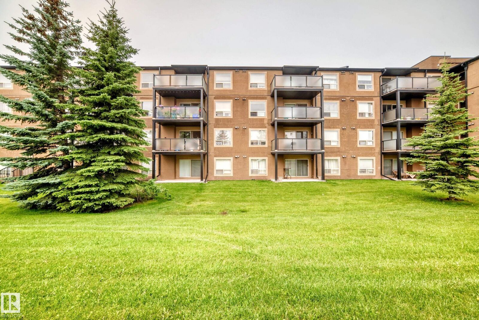 Property Photo:  13907 136 Street NW 218  AB T6V 1Y5 