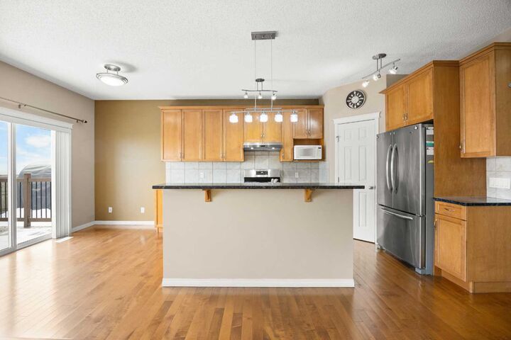 Property Photo: 65 Panora Way NW AB T3K 0R4