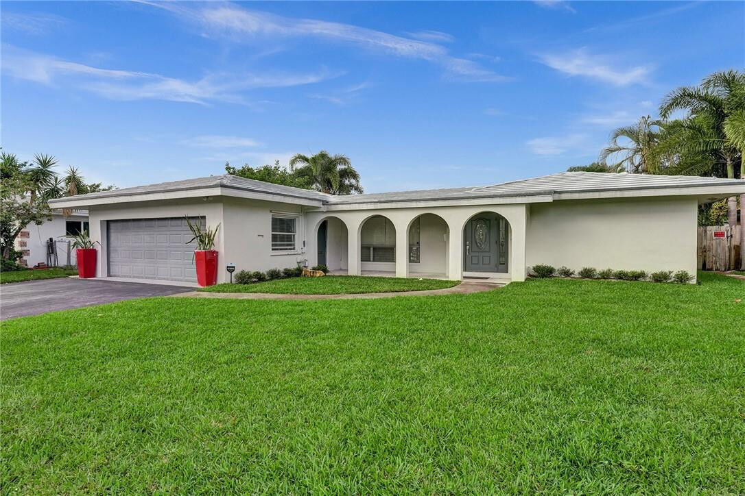 Property Photo:  5981 NE 22nd Way  FL 33308 