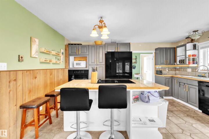 Property Photo:  5103 50 Street  AB T9M 1X2 