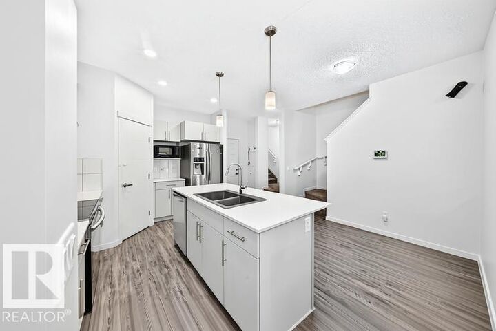 Property Photo: 19716 27 Avenue NW AB T6M 0X1