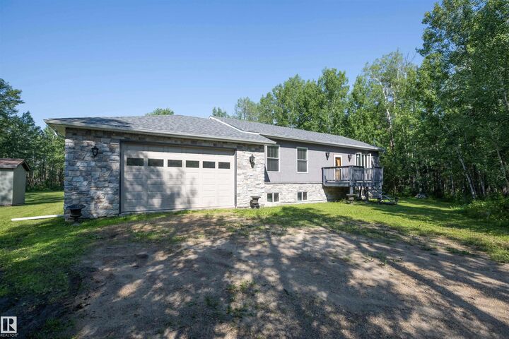 Property Photo: 204 - 57312 Rge Rd 25 AB T0E 1A0