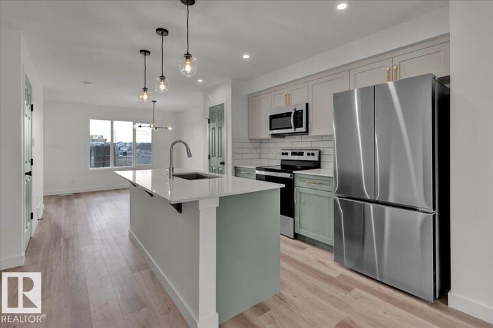 Property Photo:  18120 73 Street NW Upper  AB T5Z 0W7 