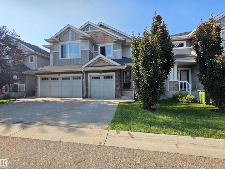 Property Photo:  2004 Trumpeter Way NW 20  AB T5S 0J9 