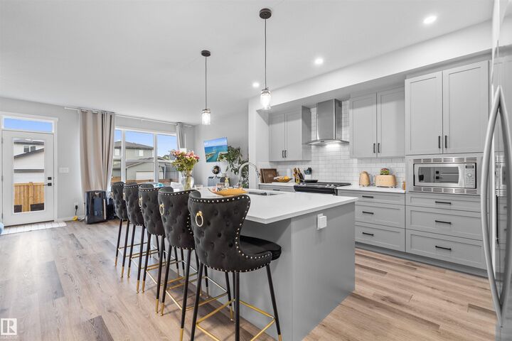 Property Photo:  9487 227 Street NW  AB T5T 7H4 