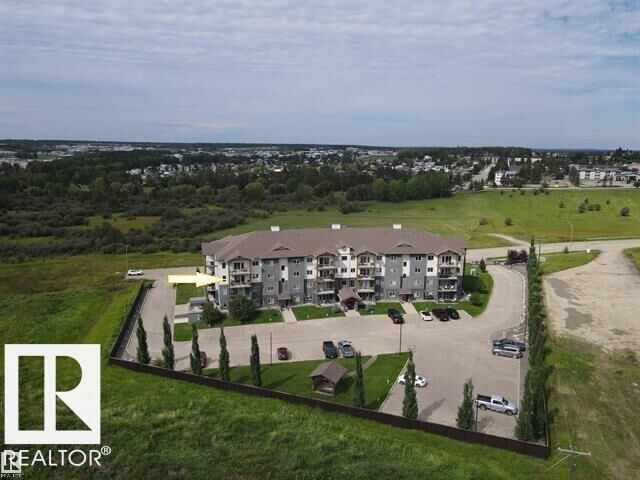 Property Photo:  #201 5201 Brougham Drive  AB T7A 0C8 