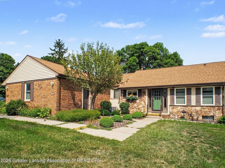 Property Photo:  522 Red Cedar Boulevard  MI 48895 