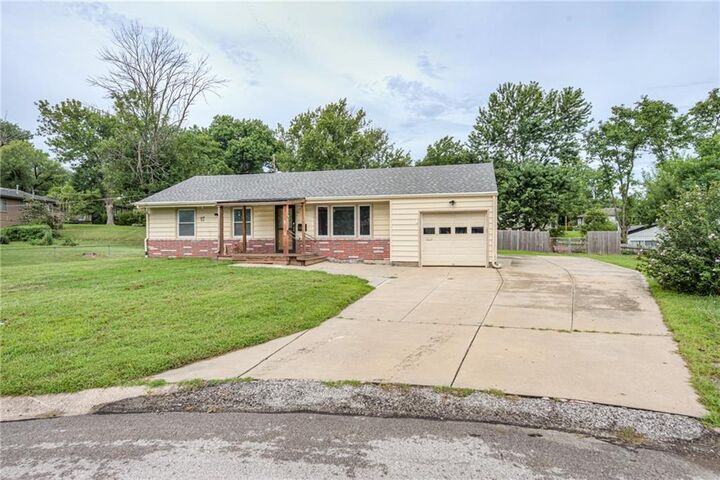 Property Photo:  3908 N Denver Court  MO 64117 