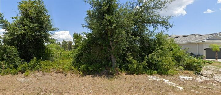 Property Photo: 9204 &Amp 9196 Ravel Street FL 33981